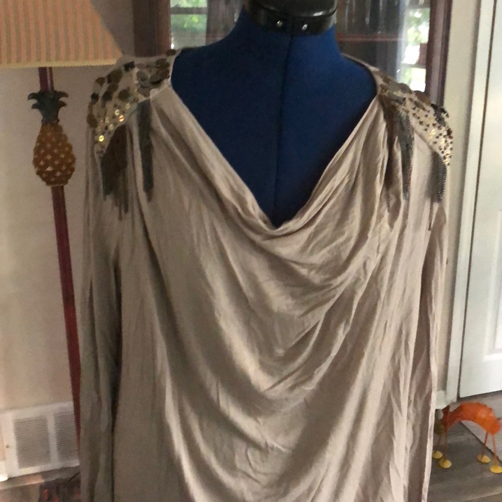 Top with embellished shoulders